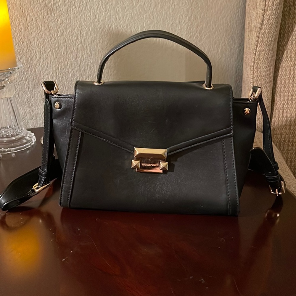 Small black Michael Kors leather purse.
